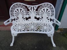 White painted metal garden bench