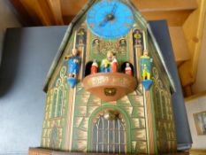 Painted wooden Continental revolving figural clock