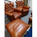 Pair of button back tan club armchairs and pouffe