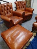 Pair of button back tan club armchairs and pouffe