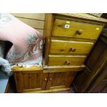 Modern pine three drawer bedside chest and a two door storage cabinet
