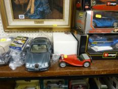 Three cased Burago diecast vehicles and four other unboxed vehicles etc