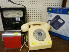 Selectest testmeter D111, a cream bakelite telephone and a boxed Speakeasy 100 telephone