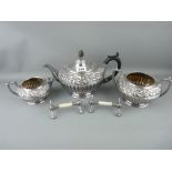 EPBM three piece teaset with oak leaf and acorn decoration along with a pair of EP and mother of