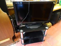 Panasonic LCD TV and a chrome and black stand E/T