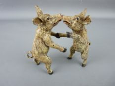 Cold bronze Bergman pair of standing kissing boars