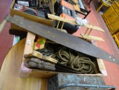 Box with vintage saws, hand tools, rope etc