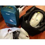 Polti steam cleaner in a canvas carry bag and a Hoover Sprint 1000 vacuum cleaner E/T