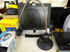 Logik small screen monitor and a black and chrome finish desk lamp E/T