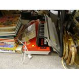 Parcel of games, annuals, old tennis racquets and Bontempi Hit child's piano on stand