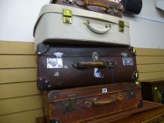 Parcel of four vintage suitcases