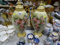 Parcel of tall twin handled lidded vases