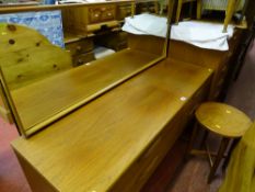 Four drawer dressing table and stool and a five drawer chest