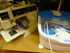 Singer Samba 6 electric sewing machine and pedal and a Babyliss footspa E/T