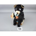 Tinplate and fabric model of a drinking wind-up bear