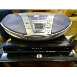 Toshiba DVD player and a Panasonic RX-ES27 portable ghetto blaster E/T