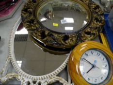 Convex mirror, wall clock and another mirror