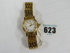 A modern yellow metal 7300L sapphire crystal ladies Gucci wristwatch with gate link bracelet