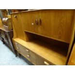 A retro G-plan light oak cupboard sideboard with pull down cupboard door & drawers