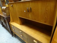 A retro G-plan light oak cupboard sideboard with pull down cupboard door & drawers