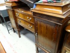 A good quality mahogany breakfront two-drawer sideboard
