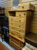 Two modern honey pine chests of drawers together with a pine swivel dressing table mirror