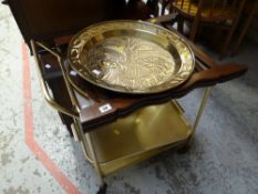 A vintage circular brass top decorated folding table, tea trolley & circular gilt framed mirror