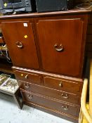 A G-plan mahogany cabinet cupboard top above a four-drawer base
