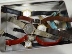 Tin of ten ladies' wristwatches