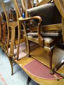 A mahogany oval extending dining table & six splat back antique dining chairs