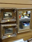 A small gilt framed wall mirror together with a pair of reproduction elaborate gilt framed prints of