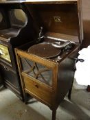 An oak cased 'His Master's Voice' windup gramophone