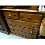 A honey pine chest of drawers, two short above three long