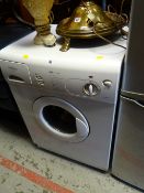 A Hotpoint washing machine in white E/T