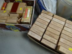 A collection of various wooden cigar boxes