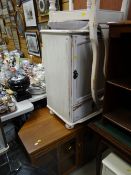 A painted white small cabinet, similar high-back chair together with a modern light wood & glazed