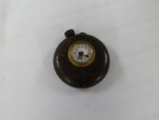 An antique button hole watch
