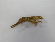 A believed 15ct gold greyhound brooch (not hallmarked - tested by vendor) on later pin, 12 grams