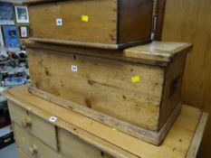 A small narrow pine chest with brass carry handles