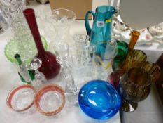 Collection of colourful and other glassware