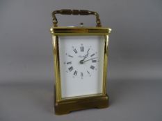 Good quality brass cased carriage clock with visible escapement (no key)