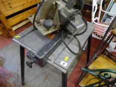 Metal work table with a bench saw