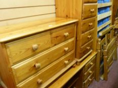 Parcel of pine bedroom furniture comprising six drawer dressing table, four drawer chest, five
