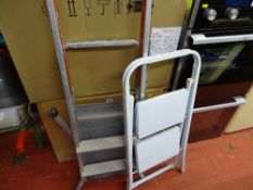 White two step ladder and a decorator's stepladder