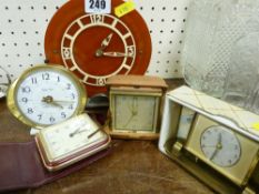 Art Deco bakelite and chrome mantel clock, two small alarm clocks and two travel clocks