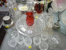 Good selection of antique and vintage decanters, cut glass cakestand and drinking glassware with a
