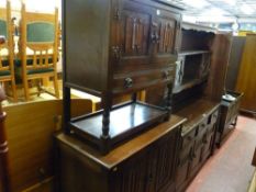 Priory style hutch type cupboard with lower drawer and an entertainment unit