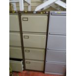 Brown four drawer metal filing cabinet (no key)