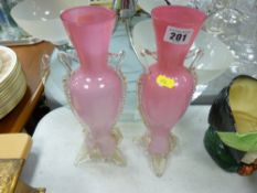 Pair of decorative pink glass vases