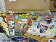 Boxed collection of action comics including 'Justice League', 'X Man', 'Micronauts' etc